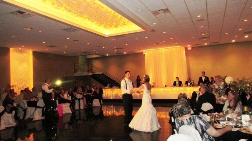 Balconade Room wedding reception bride and groom dancing