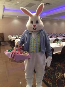 Easter Bunny holding a basket of treats