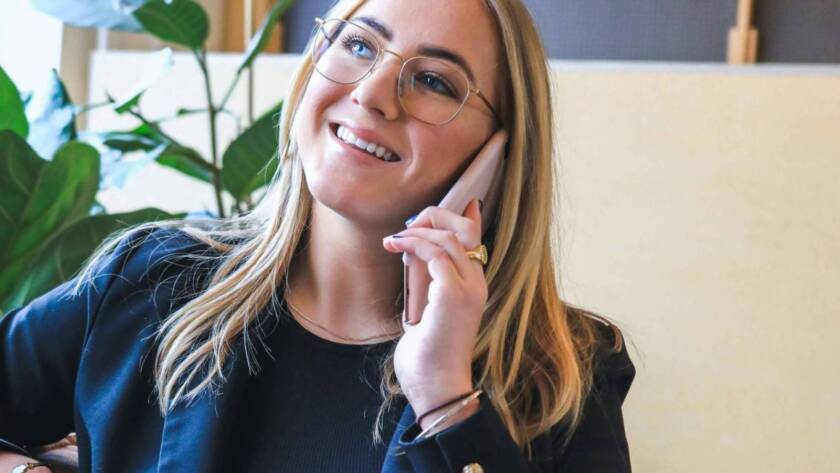 woman on phone planning an event