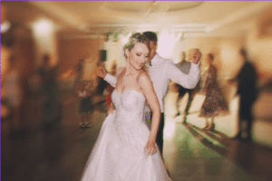 bride and groom dancing at wedding reception